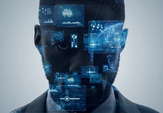 Man with data overlay displays. Blue glowing digital interfaces on face and around head.