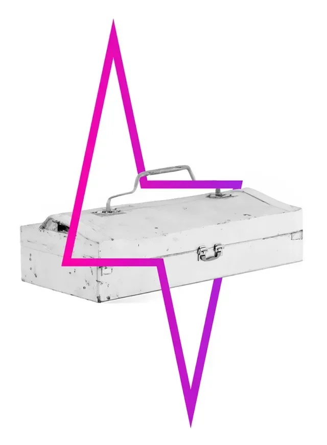 White toolbox with magenta lightning bolt graphic overlaid.