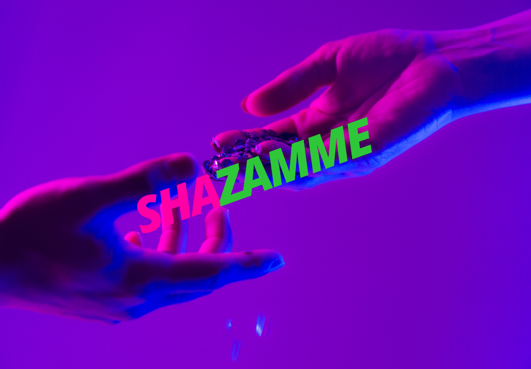 Two hands passing a small object; neon pink and green text reads