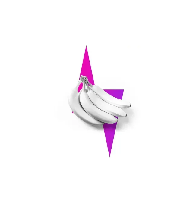 White bananas, partially behind a pink and purple lightning bolt shape, on white background.