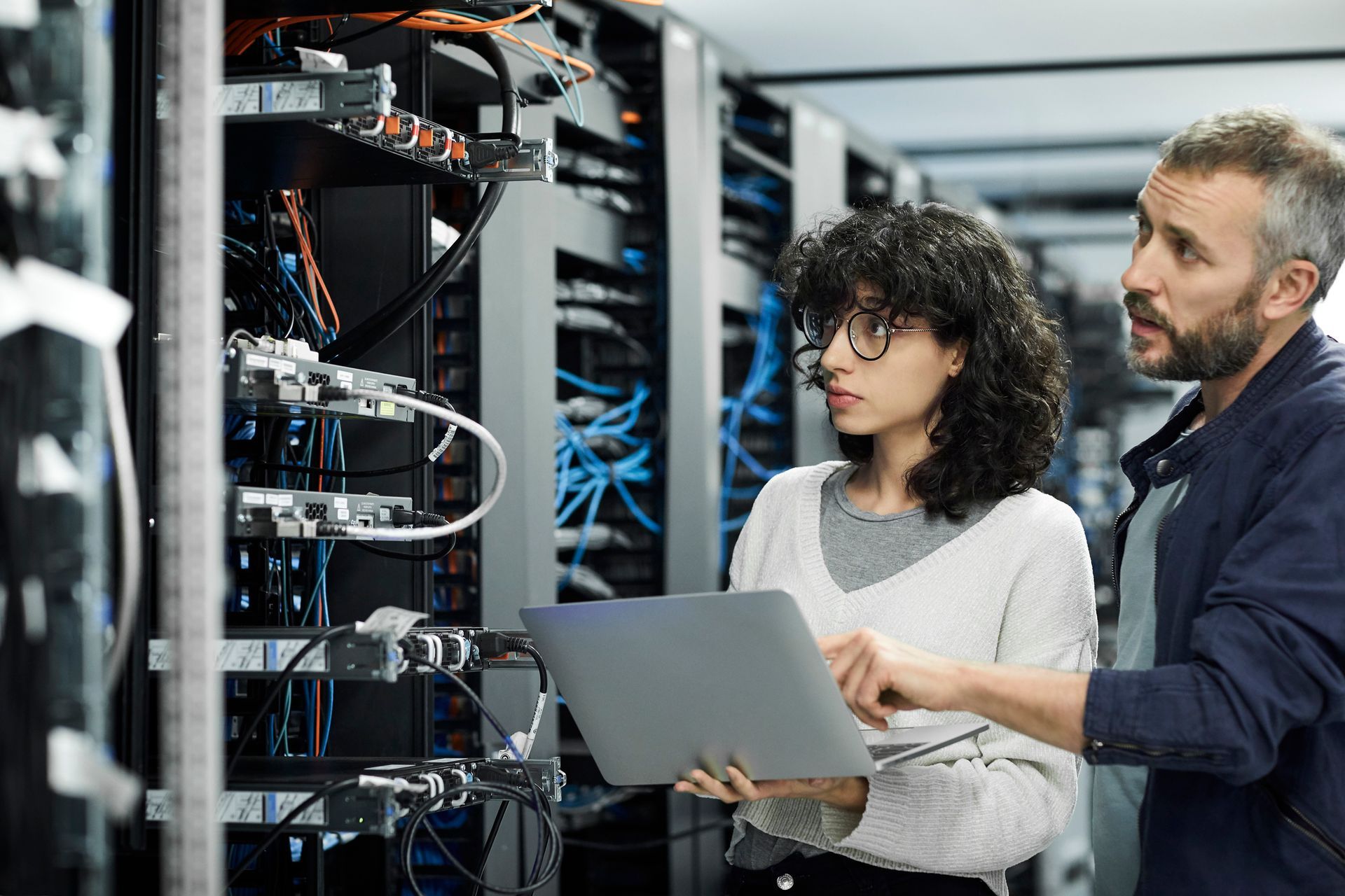 Picture Of Man And Woman In Server Room - Niota, TN - Information Solutions IT Inc.
