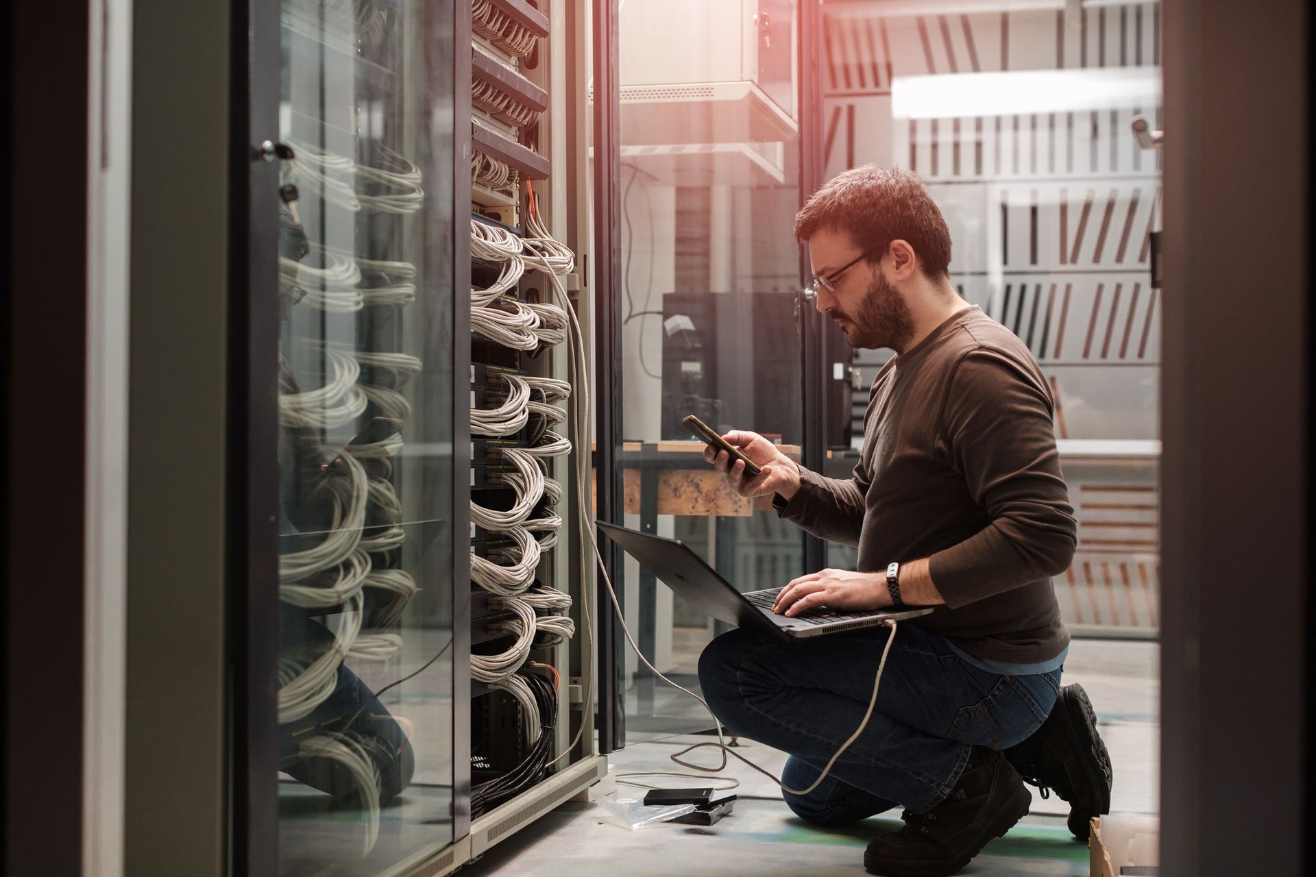 Man Fixing Server - Niota, TN - Information Solutions IT Inc.