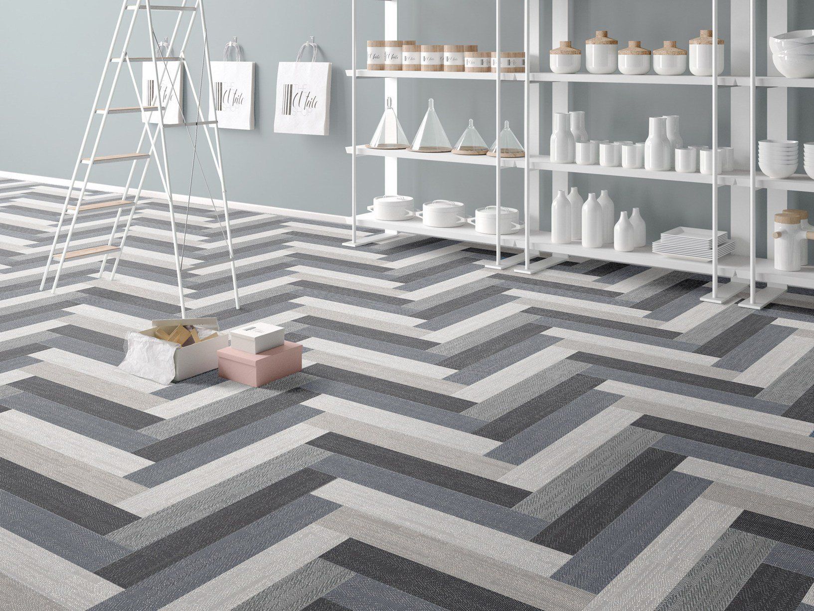 un pavimento con le piastrelle color grigio, nero e bianco