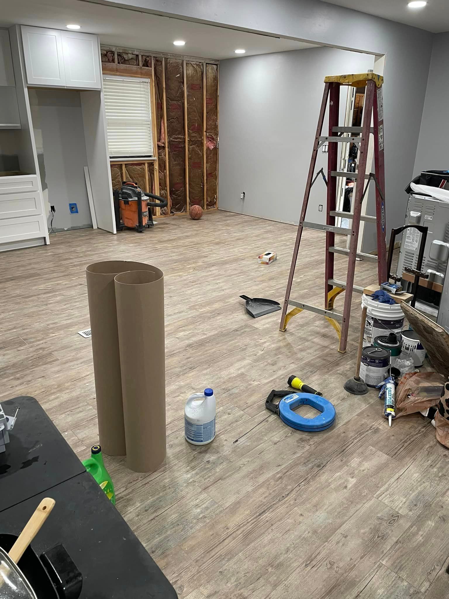 There is a ladder in the middle of the room.