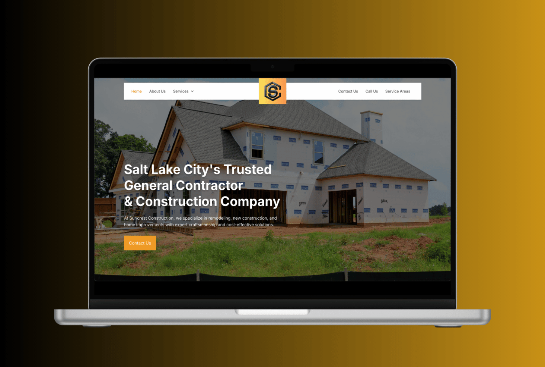 A laptop with a picture of a house on the screen.