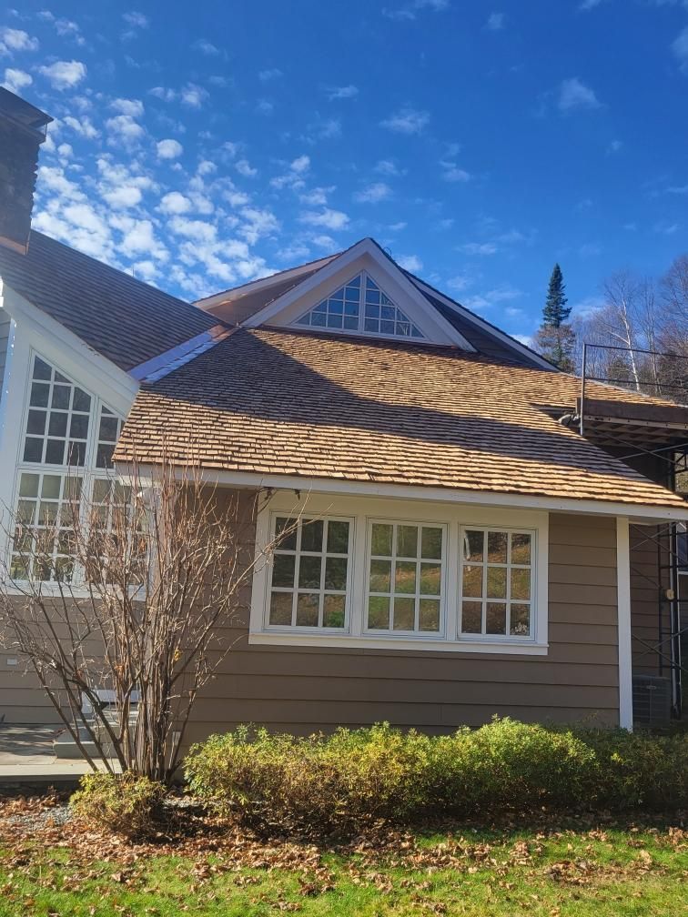 House with wood shingles and copper edging