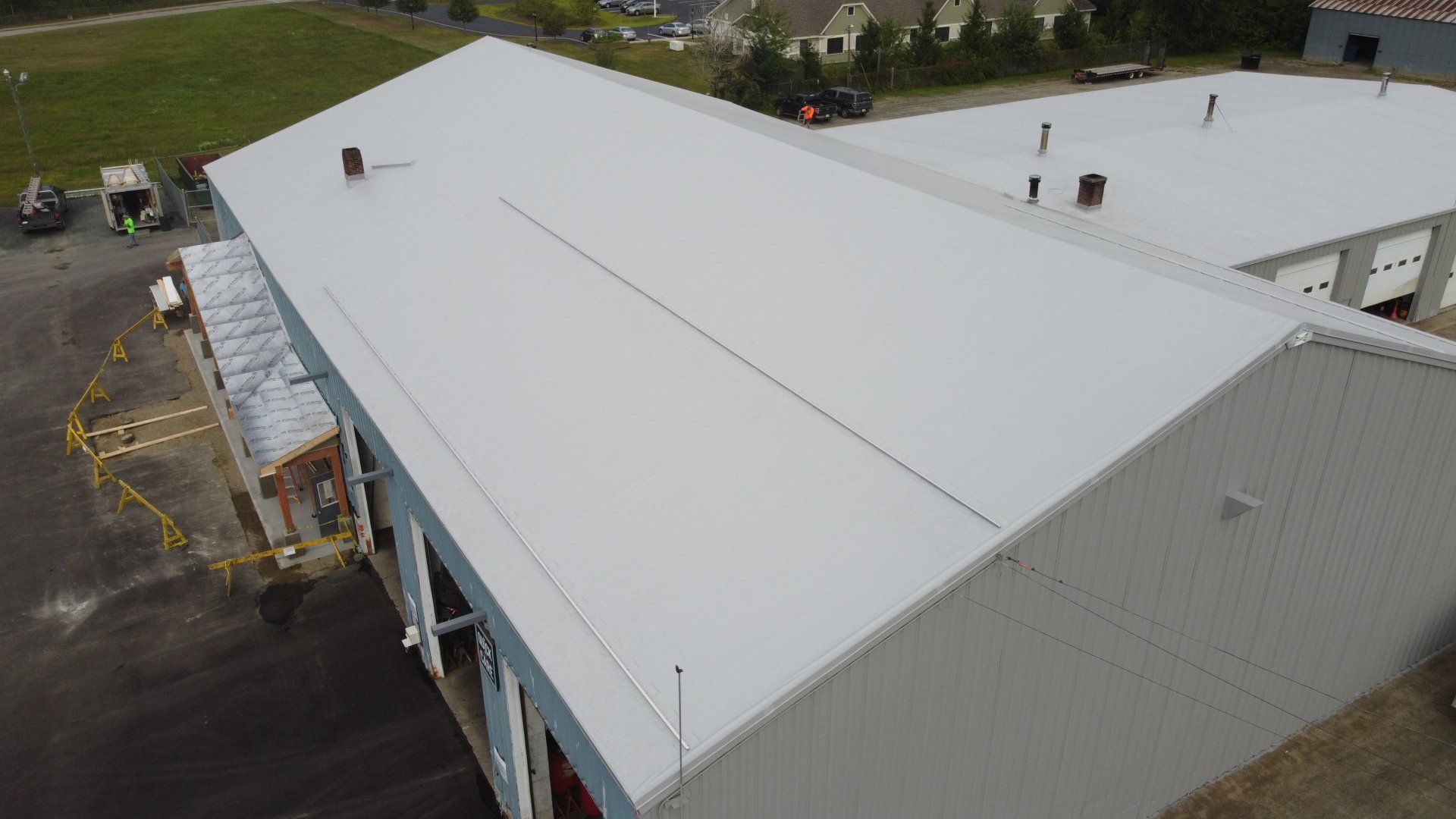 Aerial view of Rodd Roofing’s metal retrofit project on a large industrial building.