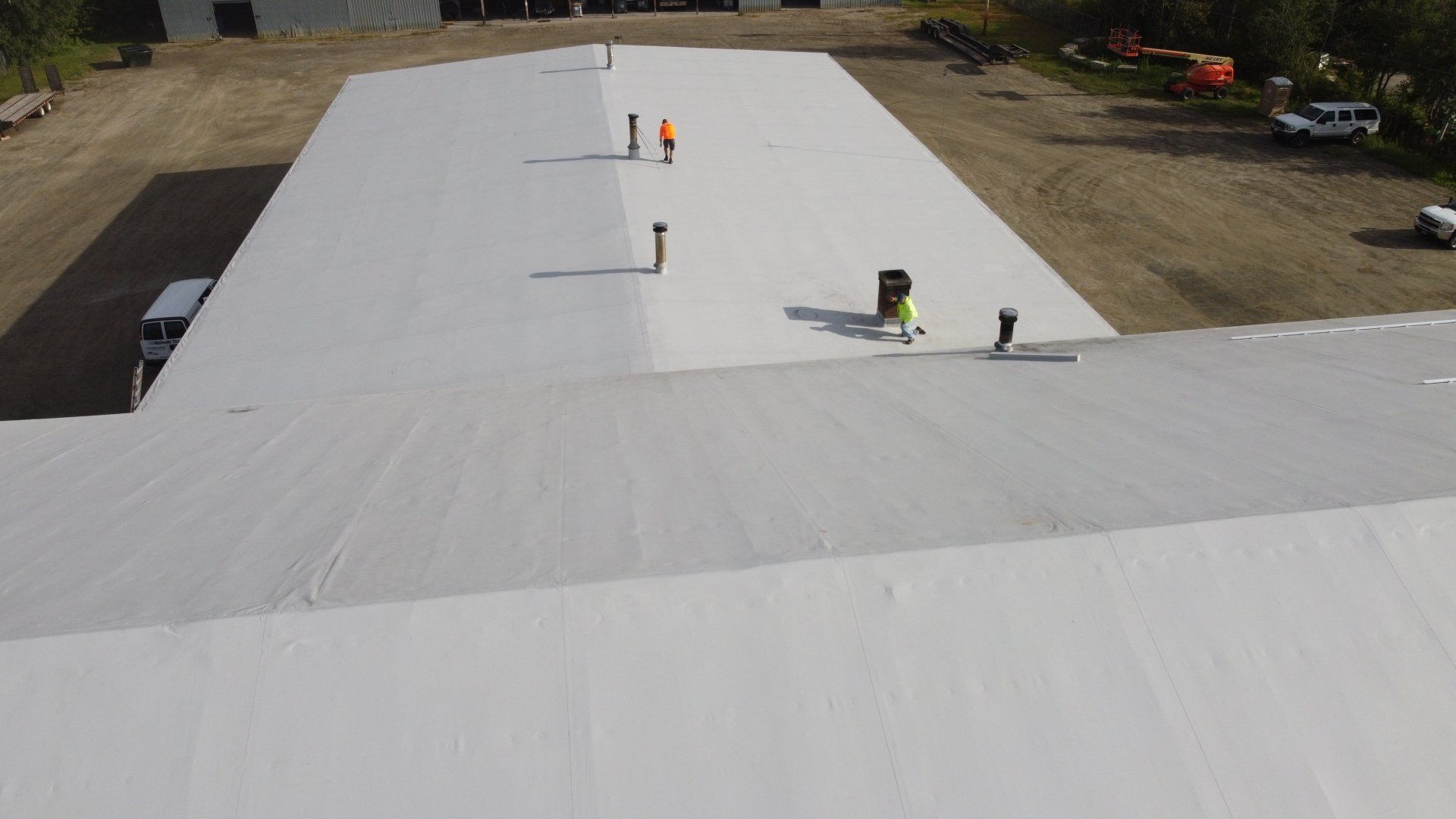 Aerial view of Rodd Roofing’s metal retrofit project on a large industrial building.