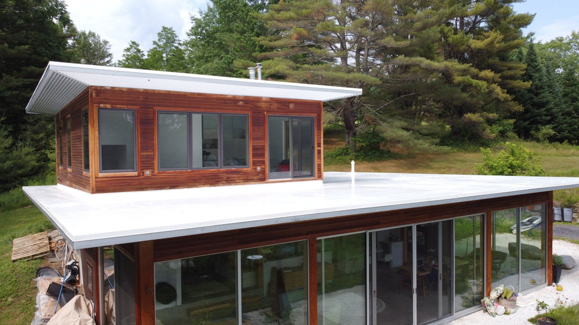 A completed residential flat roofing system on a home in Vermont