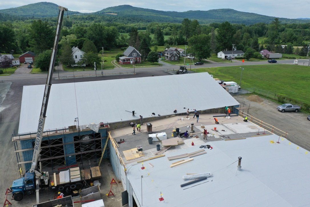 almost completed roof from above with exposed metal