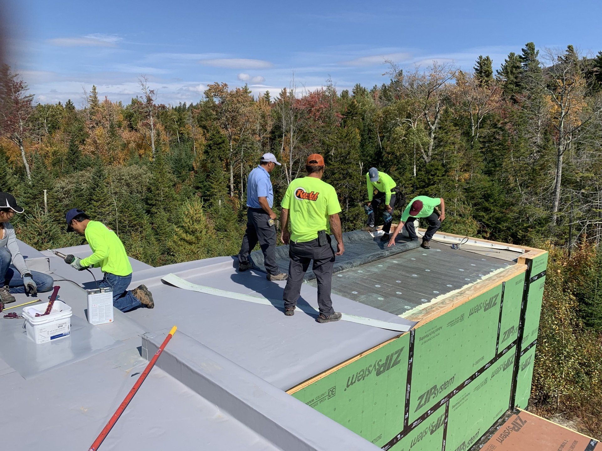 Rodd Roofing employees installing a TPO/PVC Roof