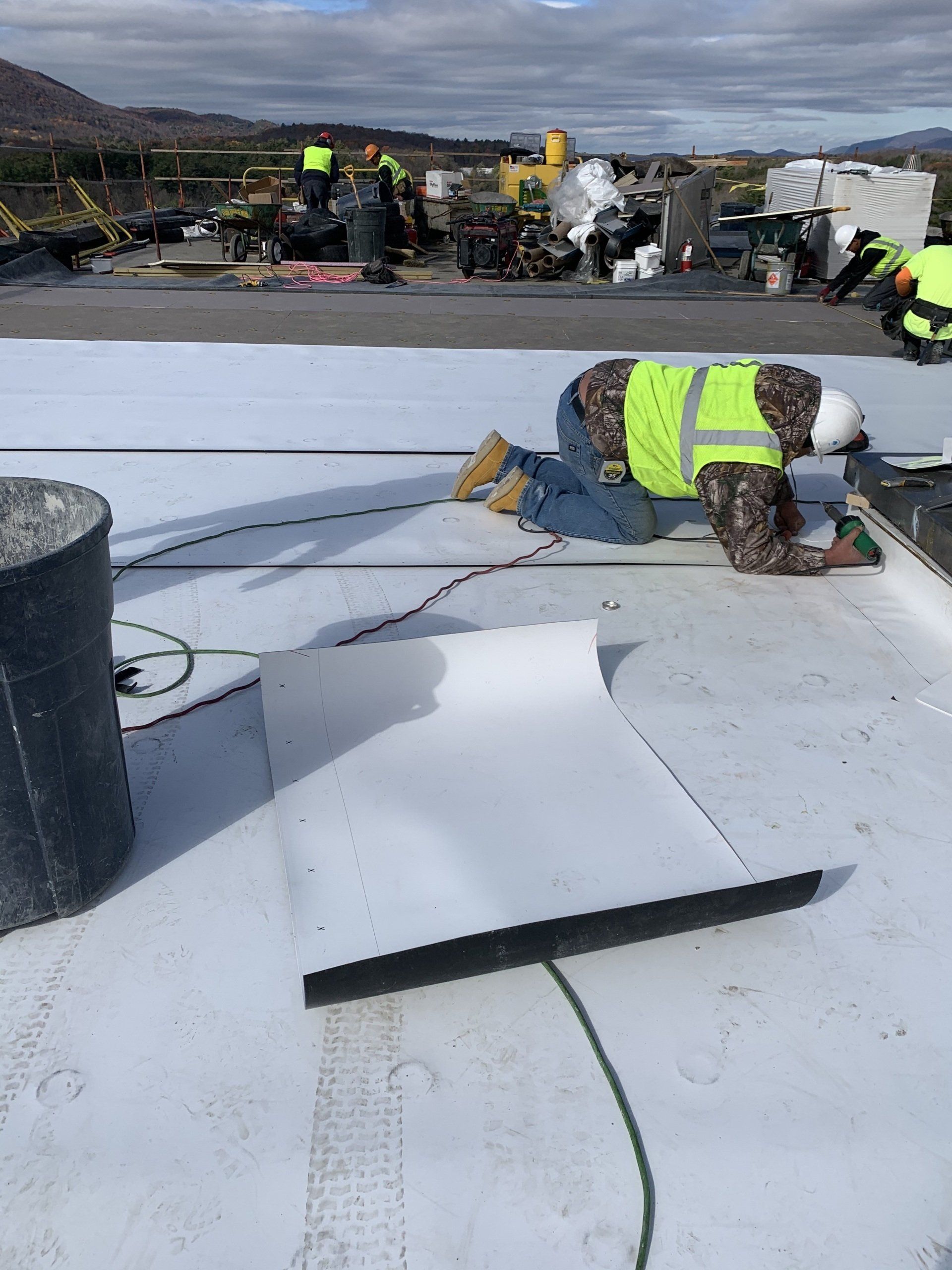 Rodd Roofing team working on silicone roof