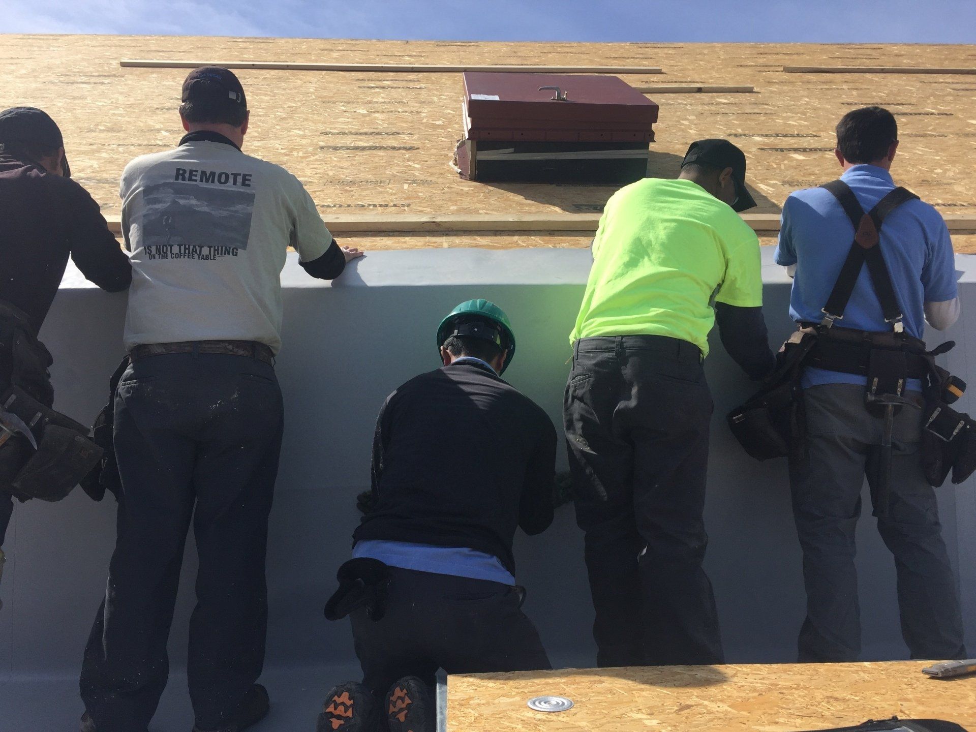 Rodd Roofing employees installing a new roof in New Hampshire