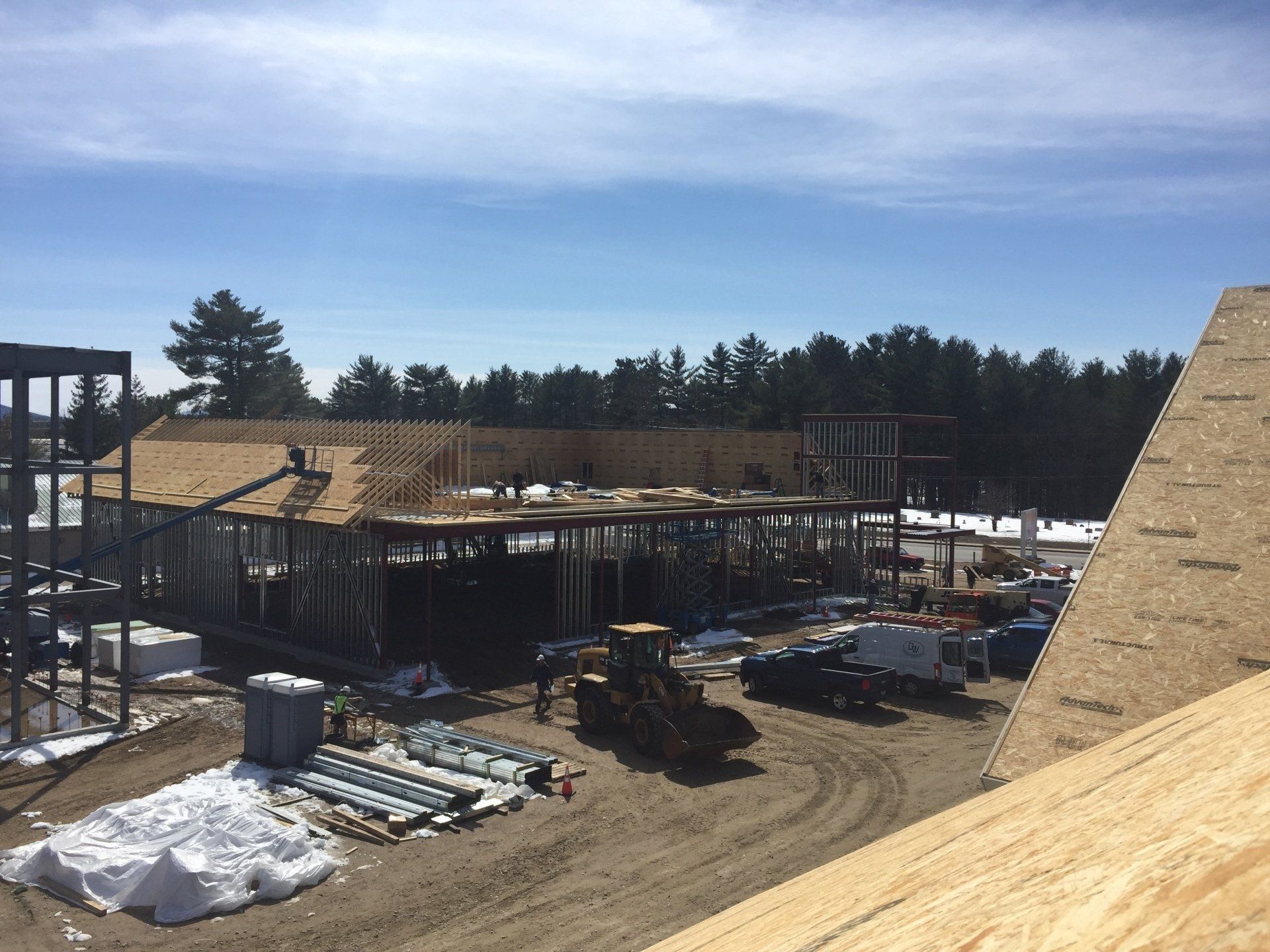 Rodd Roofing equipment lifting roofing products for a new roof