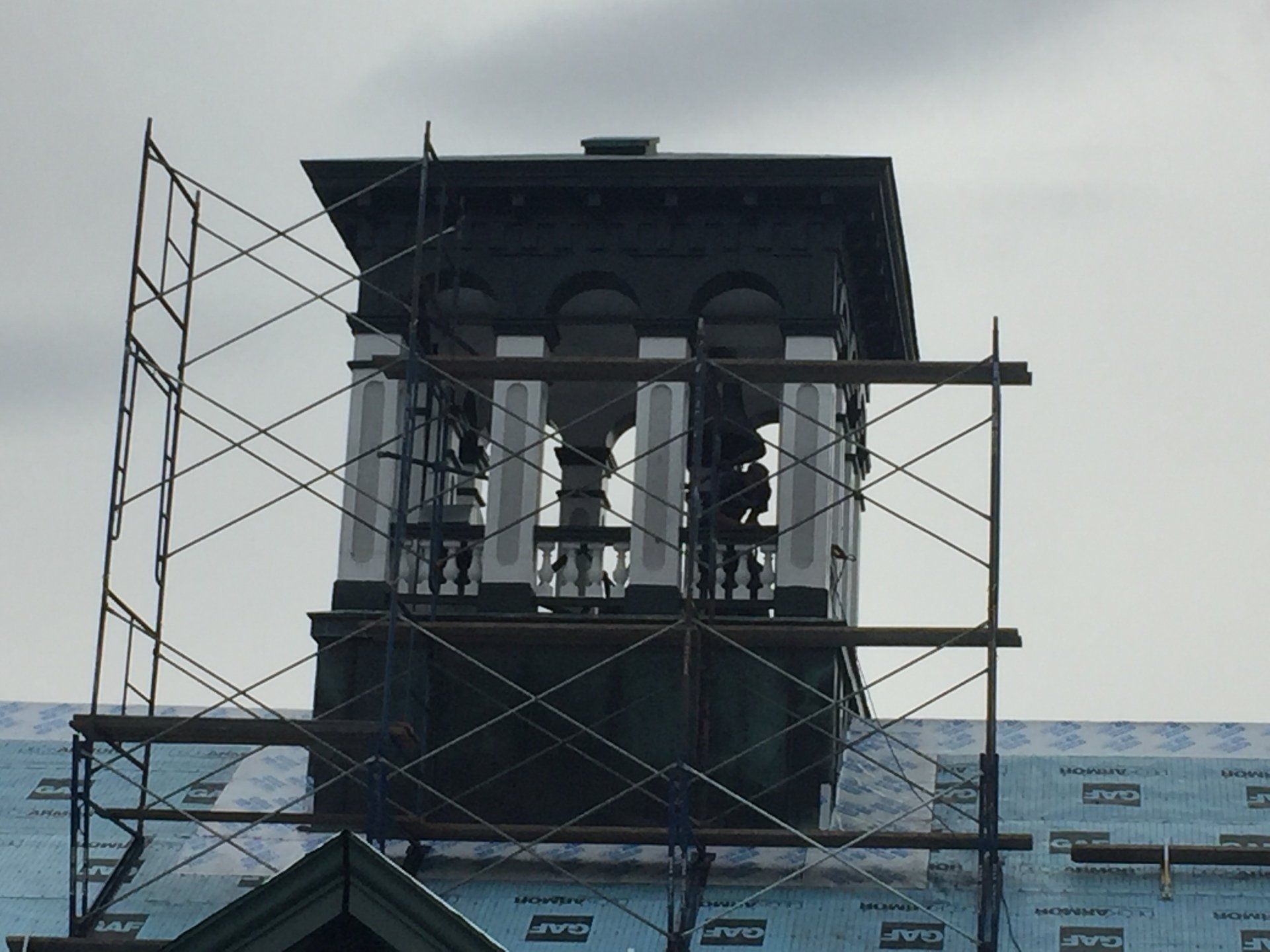 A building under construction with scaffolding around it