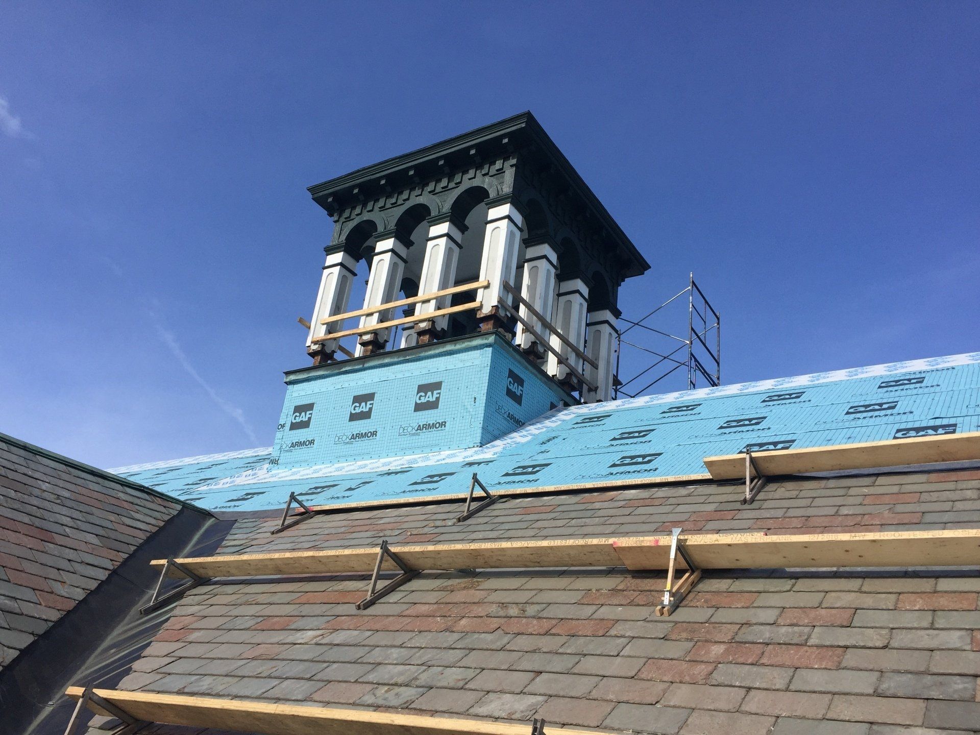 A roof with a chimney on top of it.