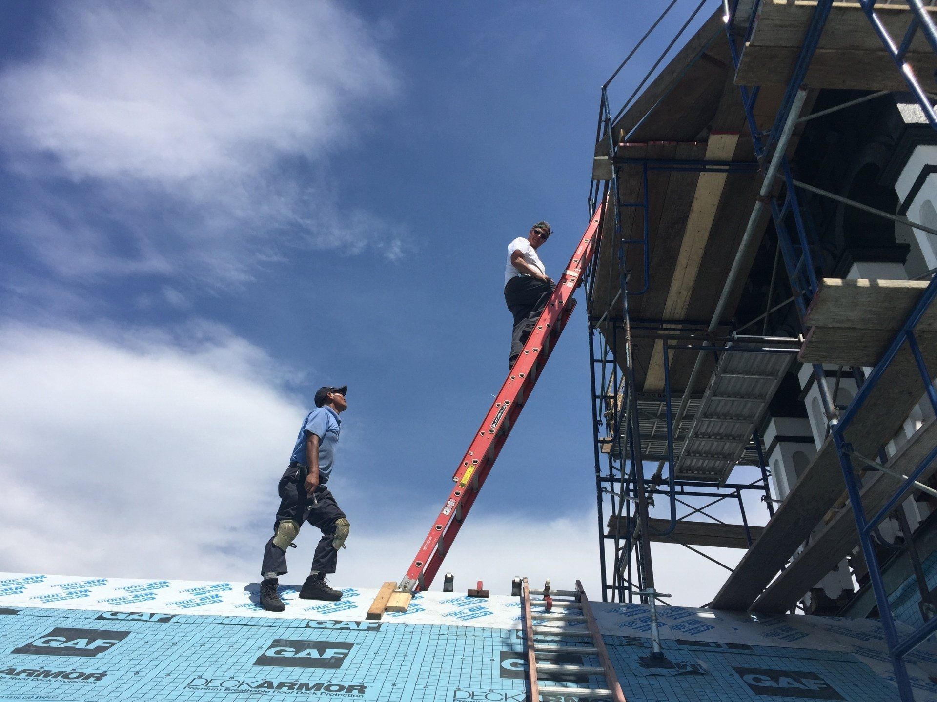 Rodd Roofing  employees preparing a commercial for a slate roof