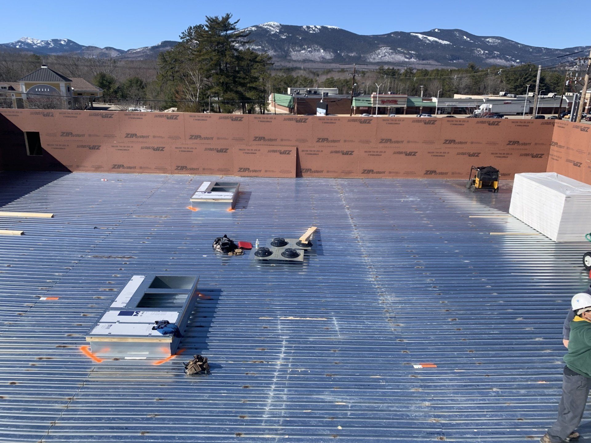 A commercial flat roof under construction by Rodd Roofing in Vermont