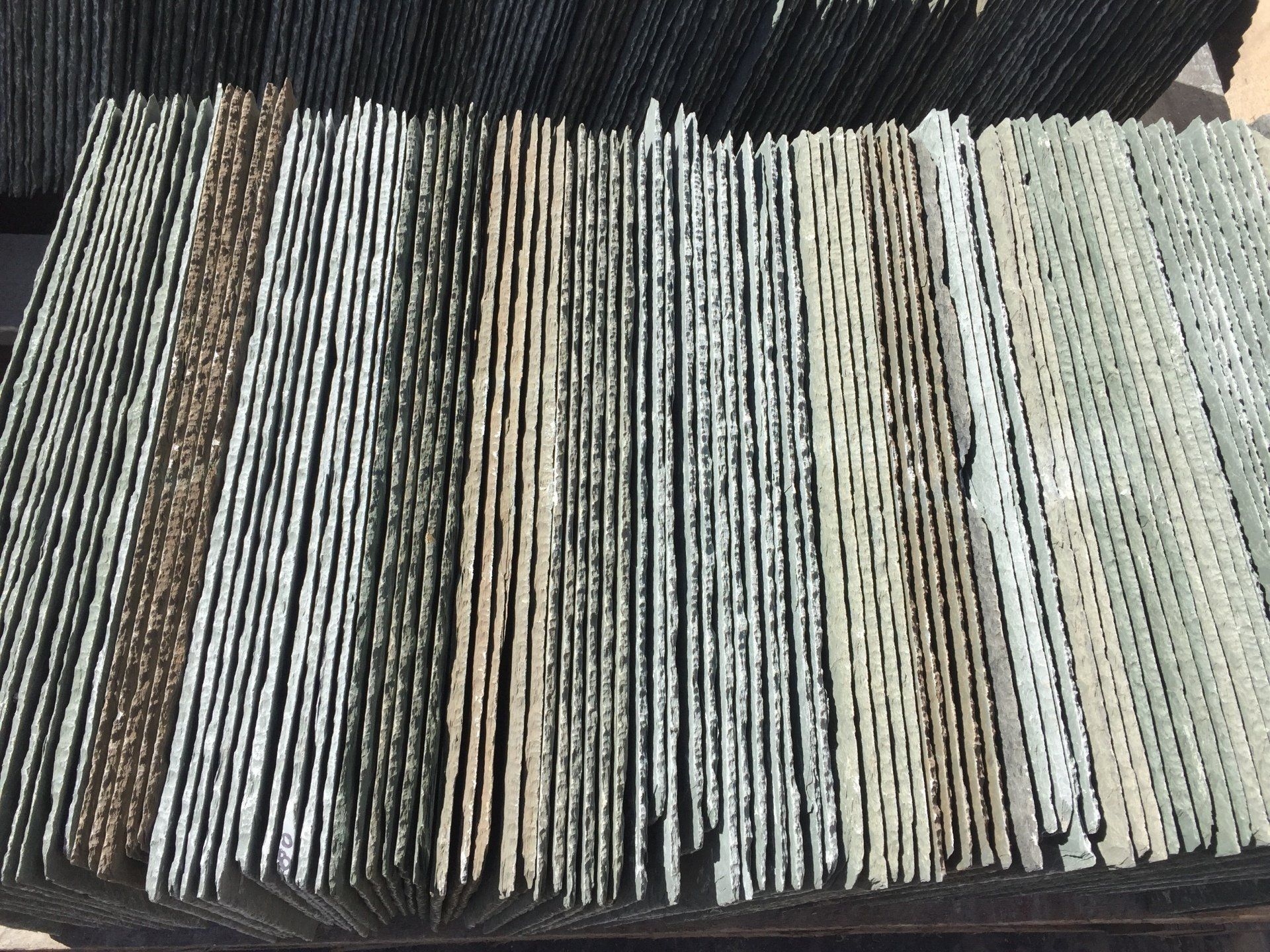 A bunch of sticks are stacked on top of each other