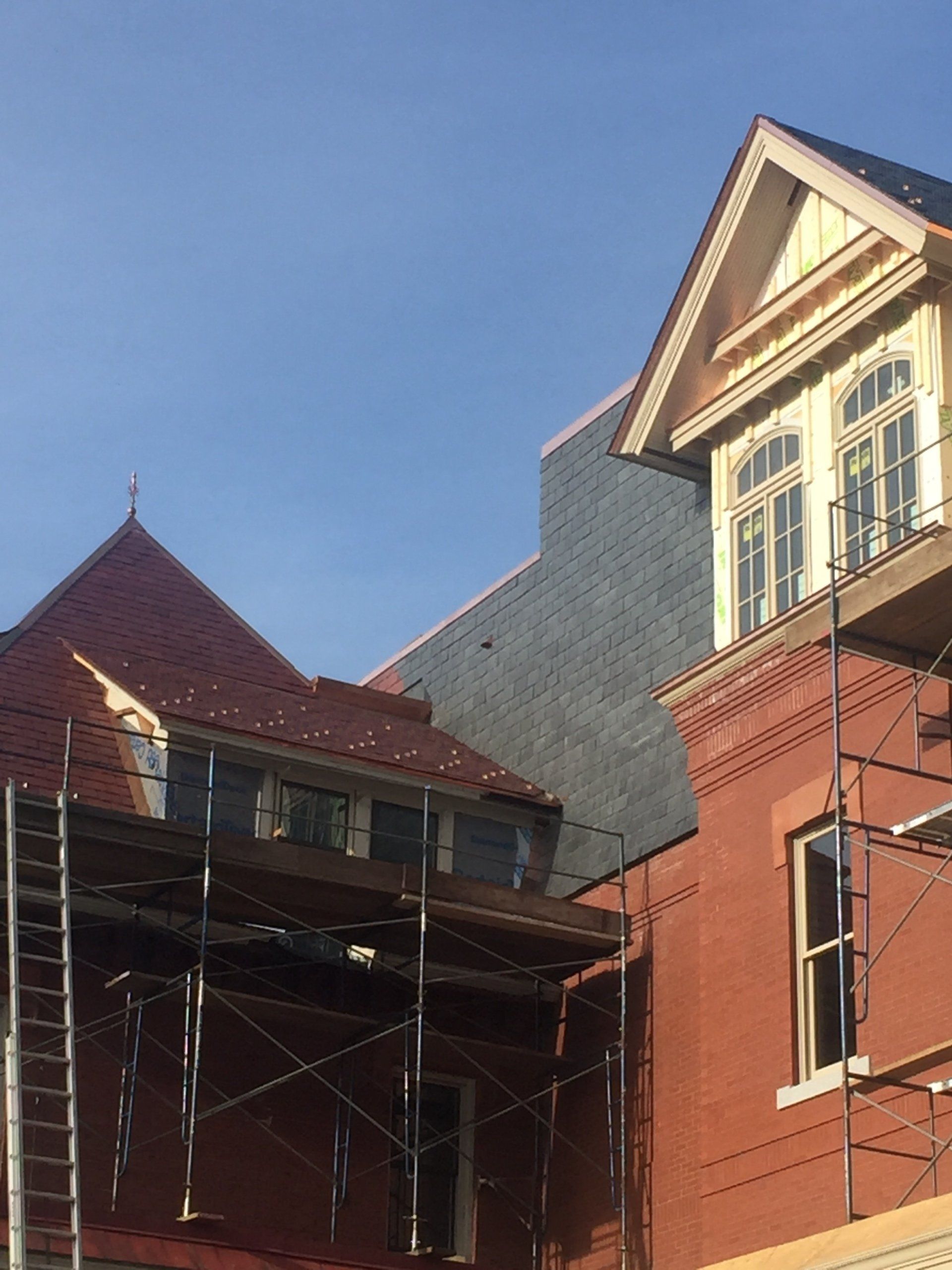 Rodd Roofing installing a slate roof for a high school in Vermont