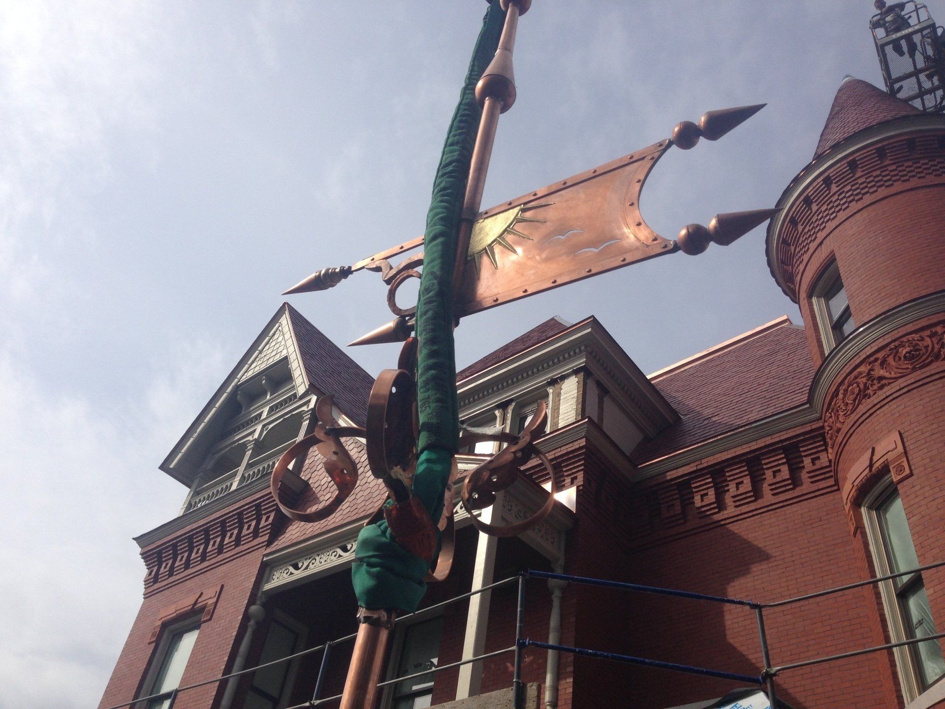 Rodd Roofing installing decorative roof cap for a high school in Vermont