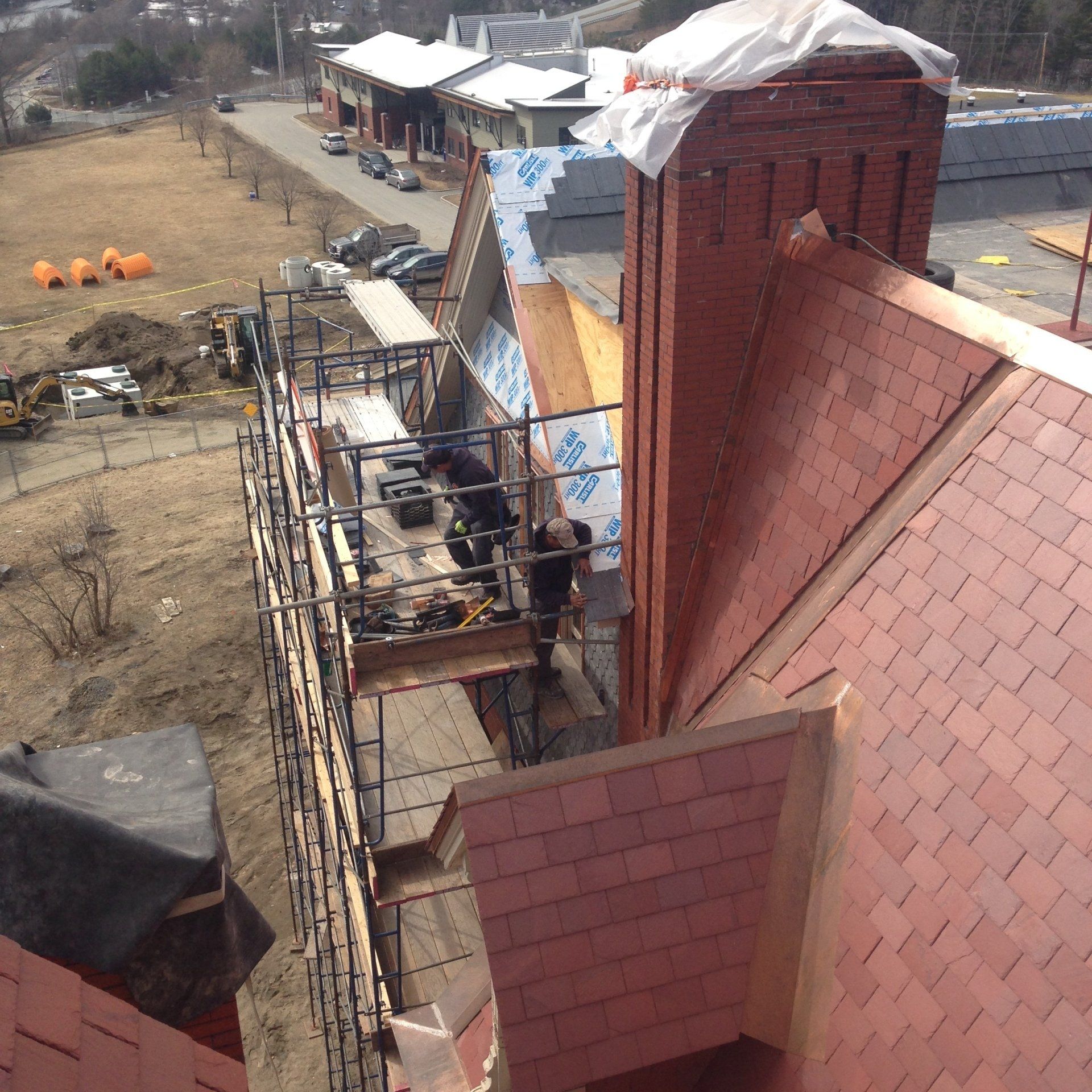 Rodd Roofing installing a slate roof for a high school in Vermont