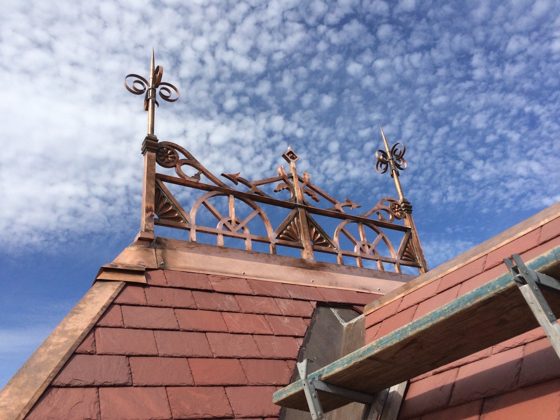 a commercial roof line against the sky