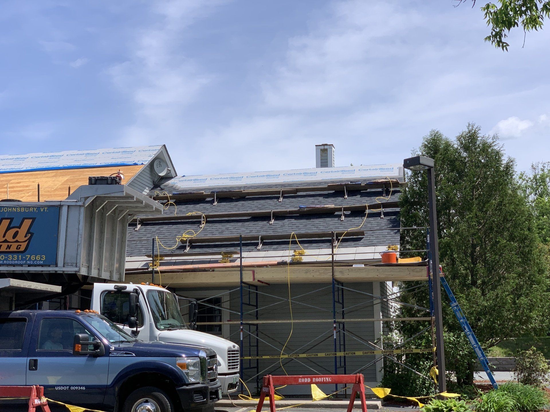 Rodd Roofing; Asphalt roof on a residential home.
