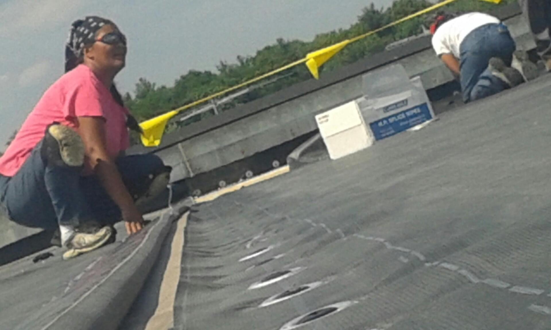 commercial roofing contractor in Vermont working on a single ply roof