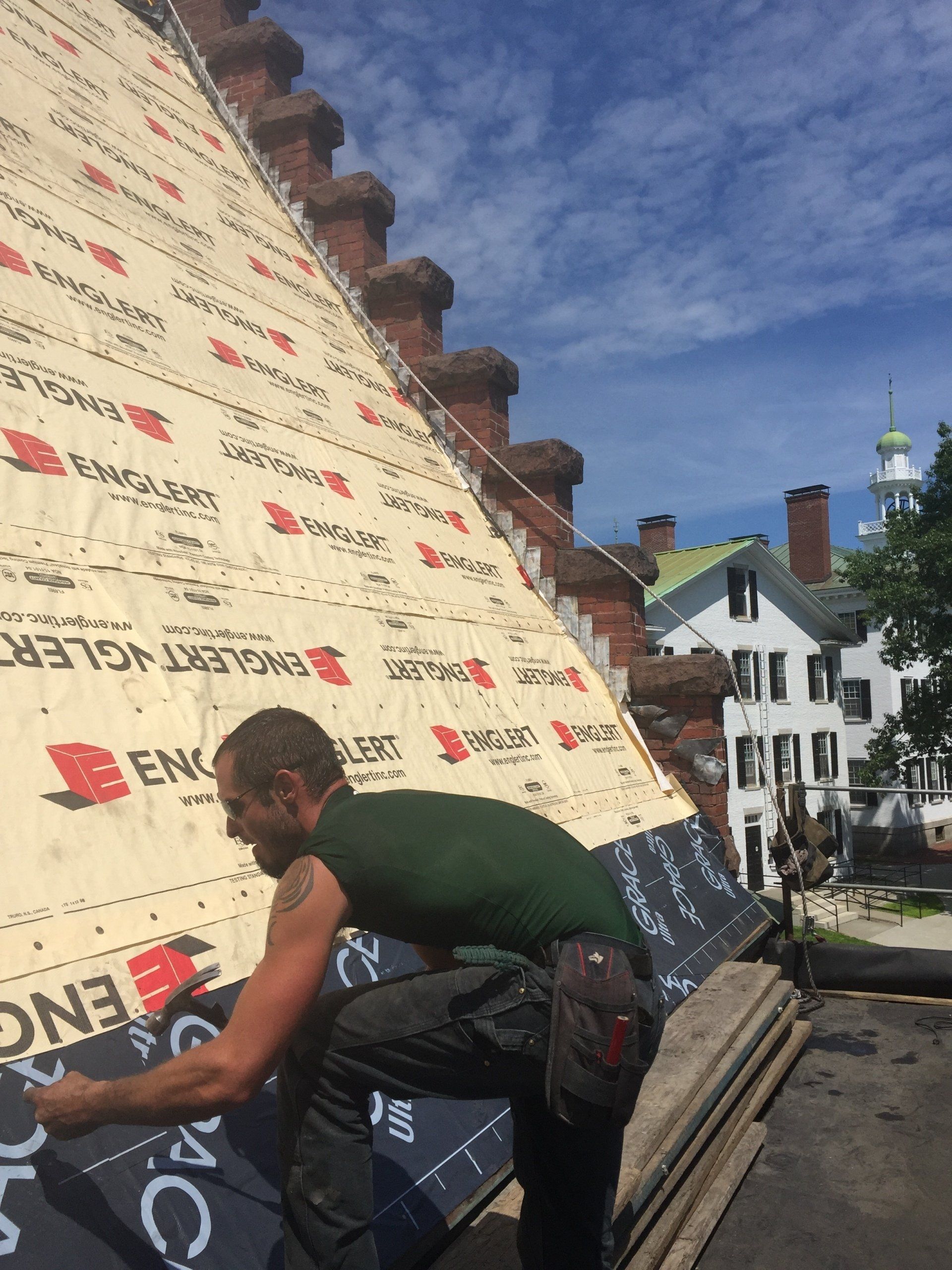 commercial roofing contractor in Vermont preparing a roof
