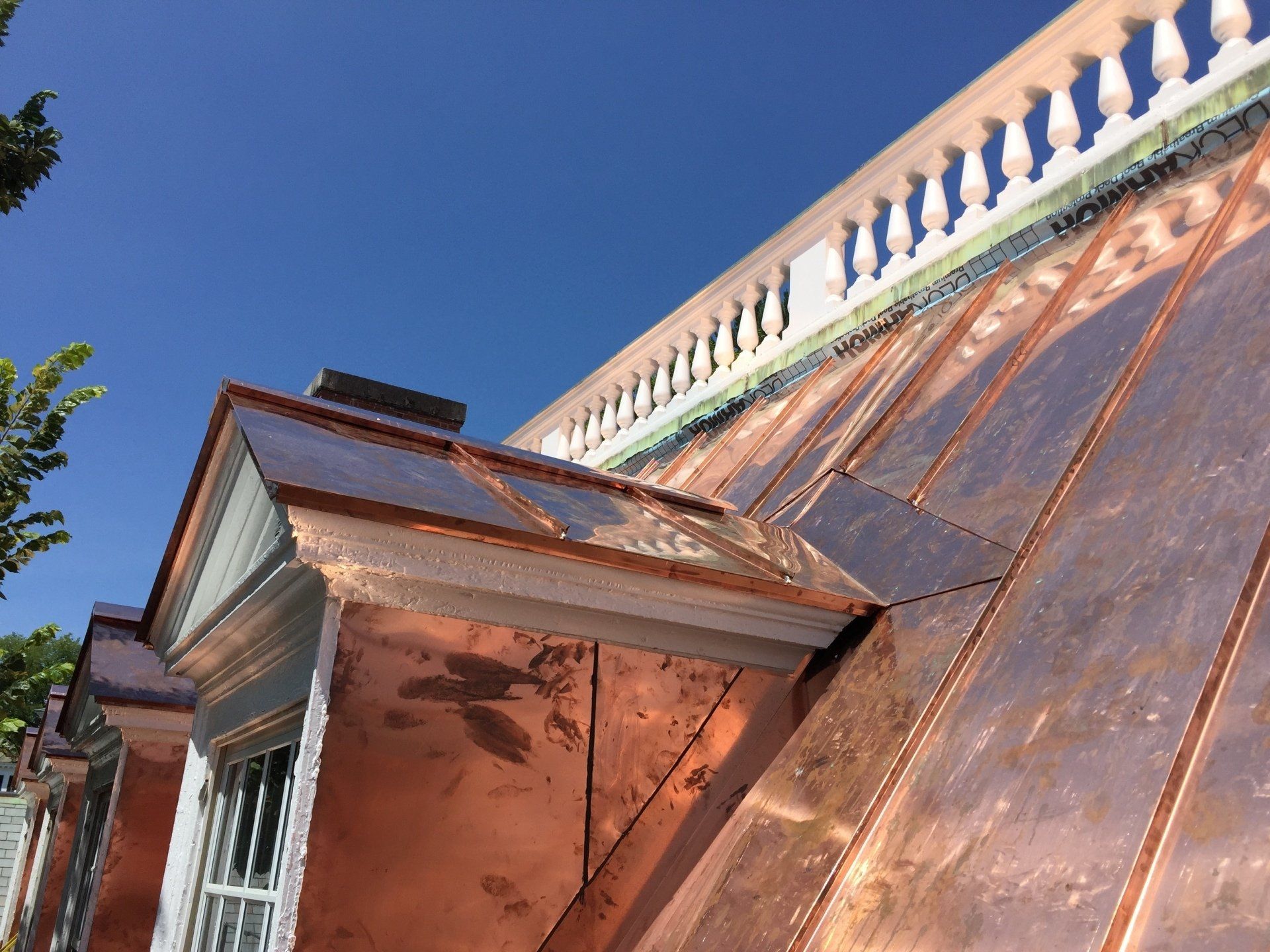 A copper roof on a commercial budling