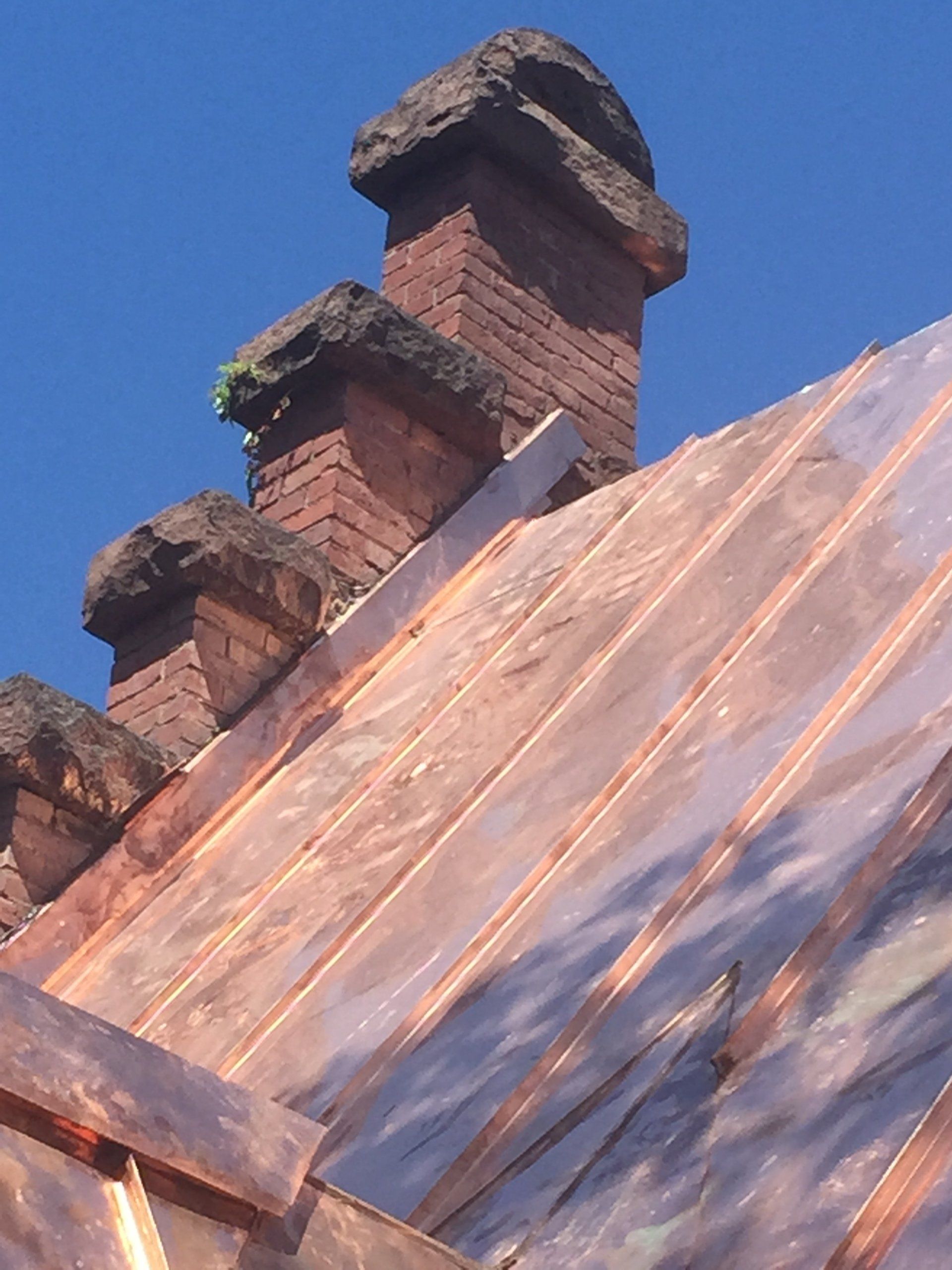 A roof with a chimney on top of it