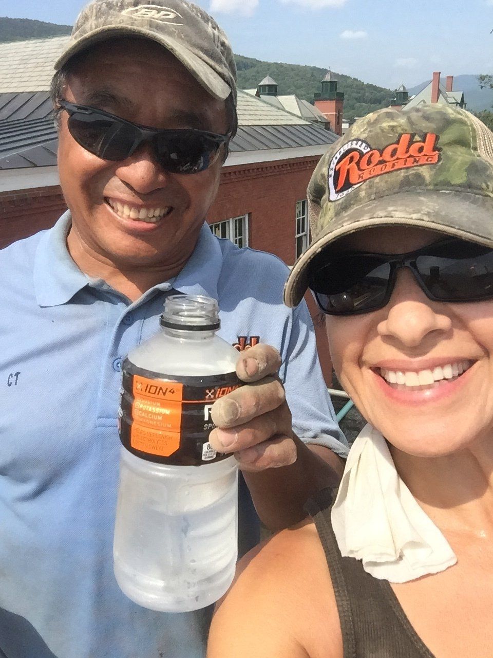 Rodd Roofing employees standing together taking a selfie