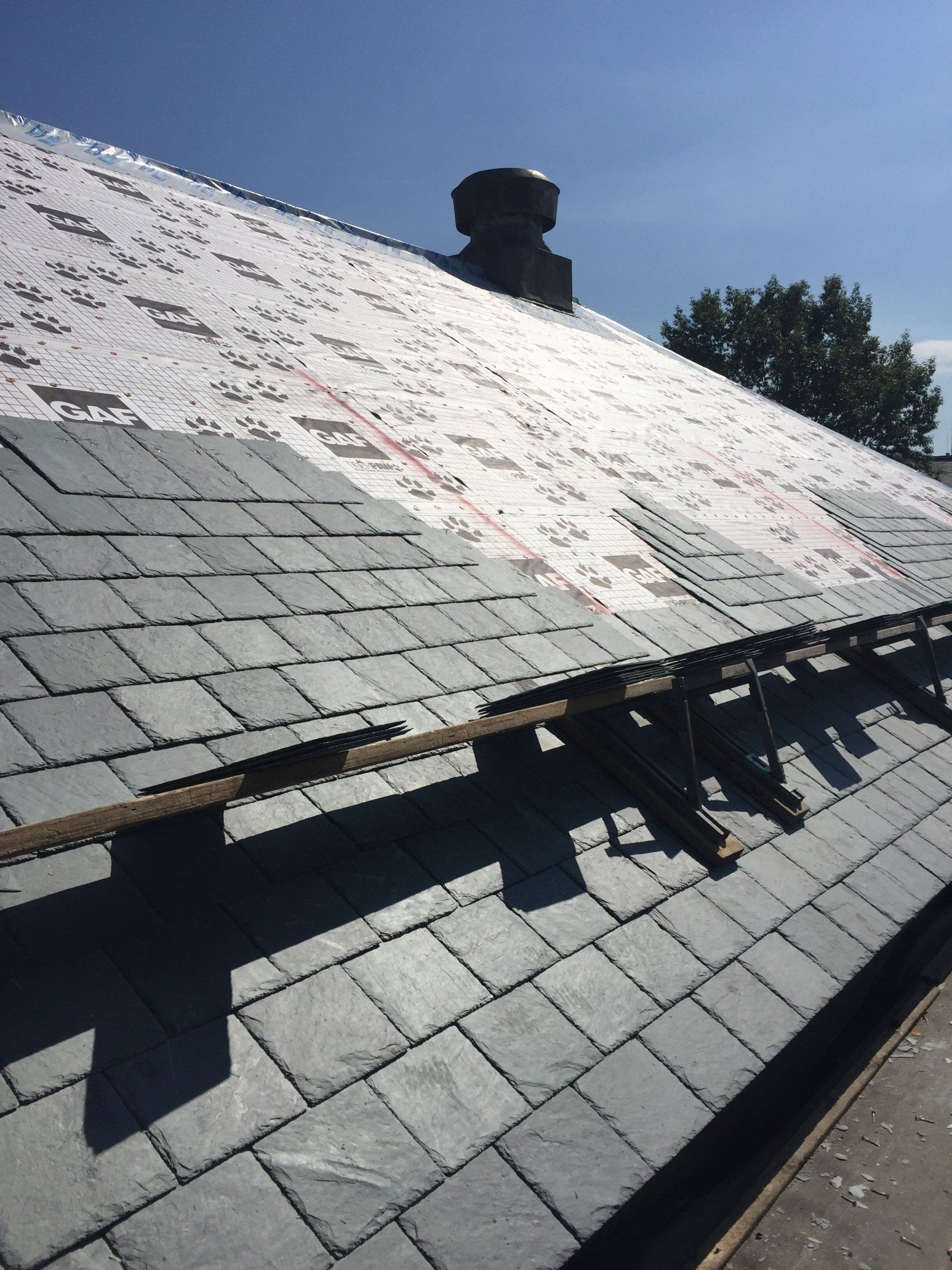 A roof with a chimney on top of it