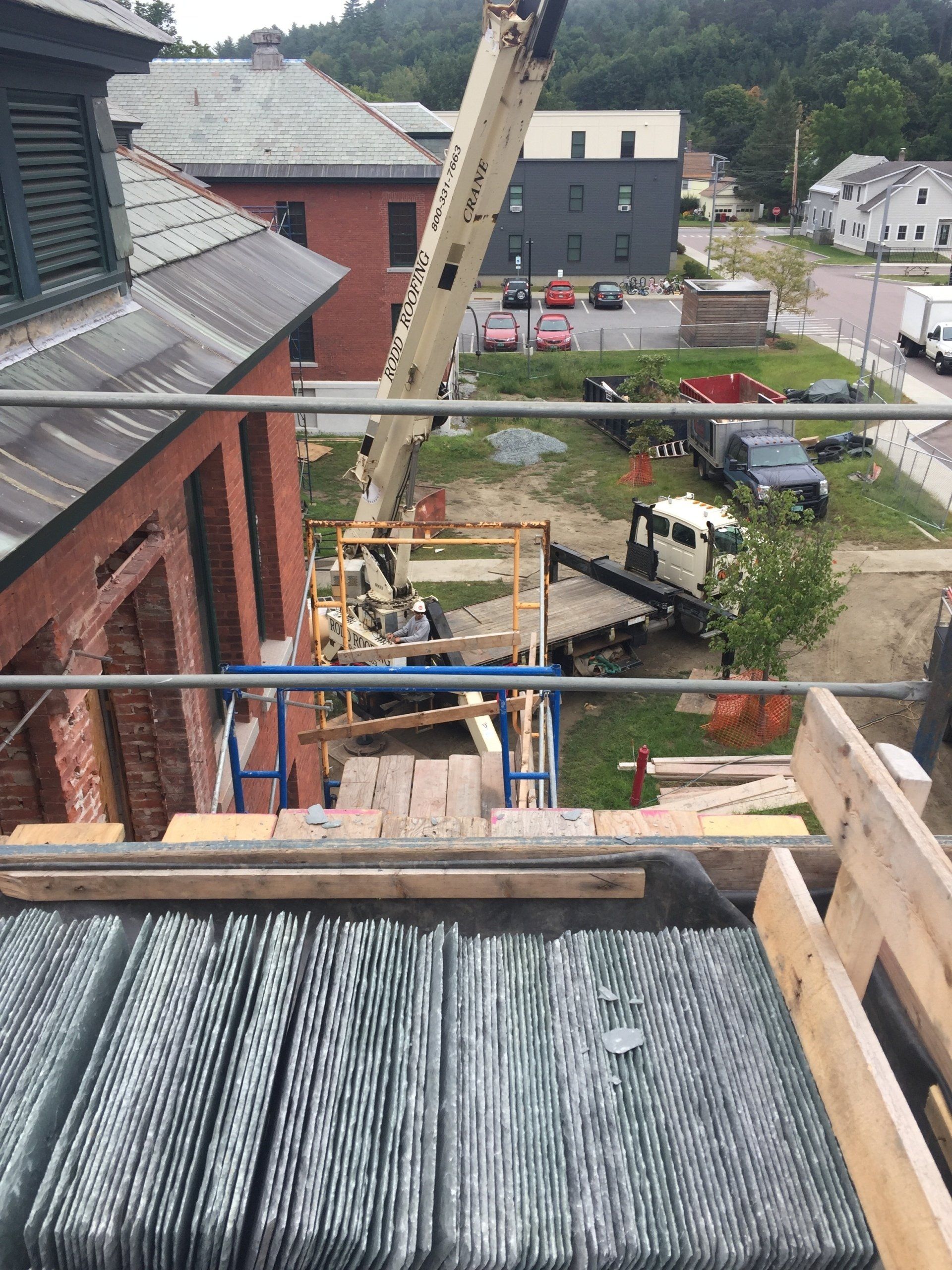 A view of a construction site from the top of a building