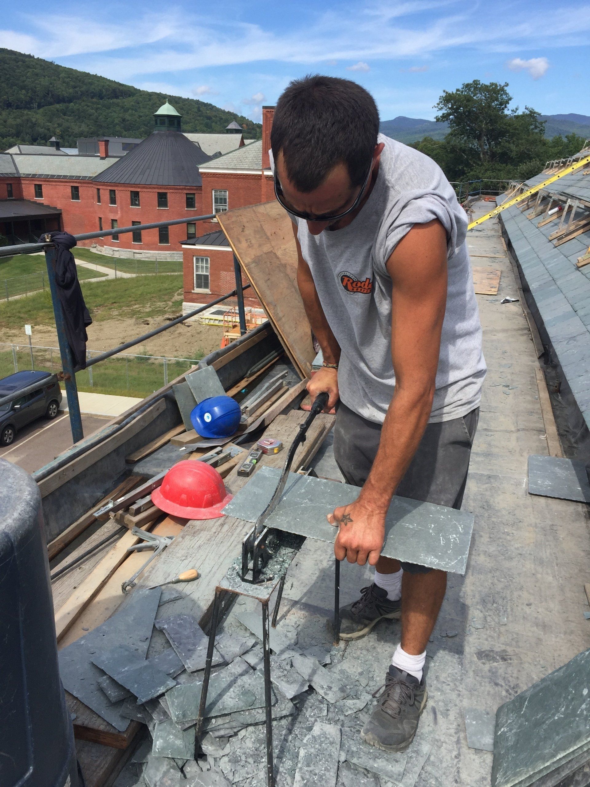 Rodd Roofing employees installing a slate roof