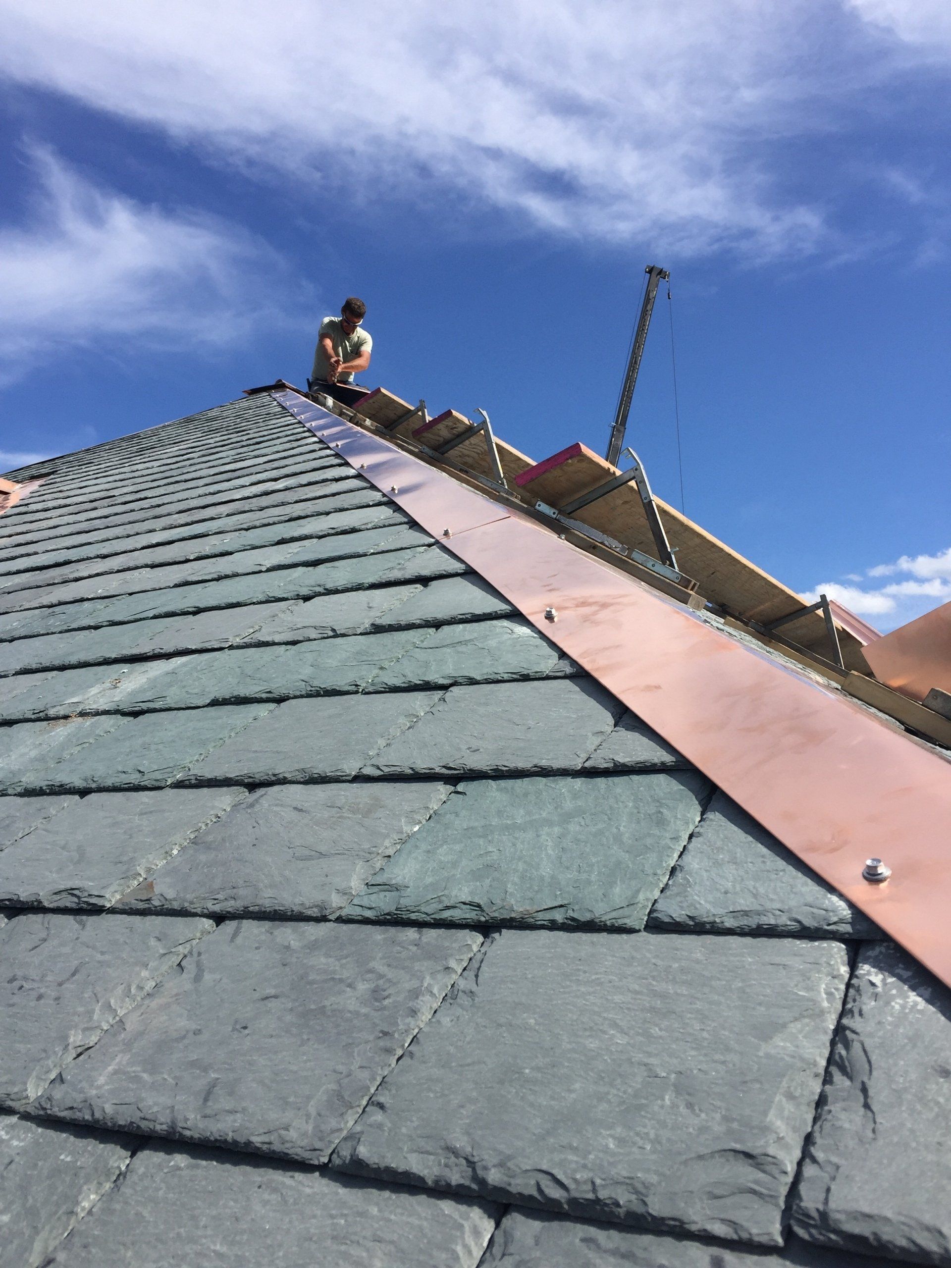 Rodd Roofing installed a slate roof with copper edges