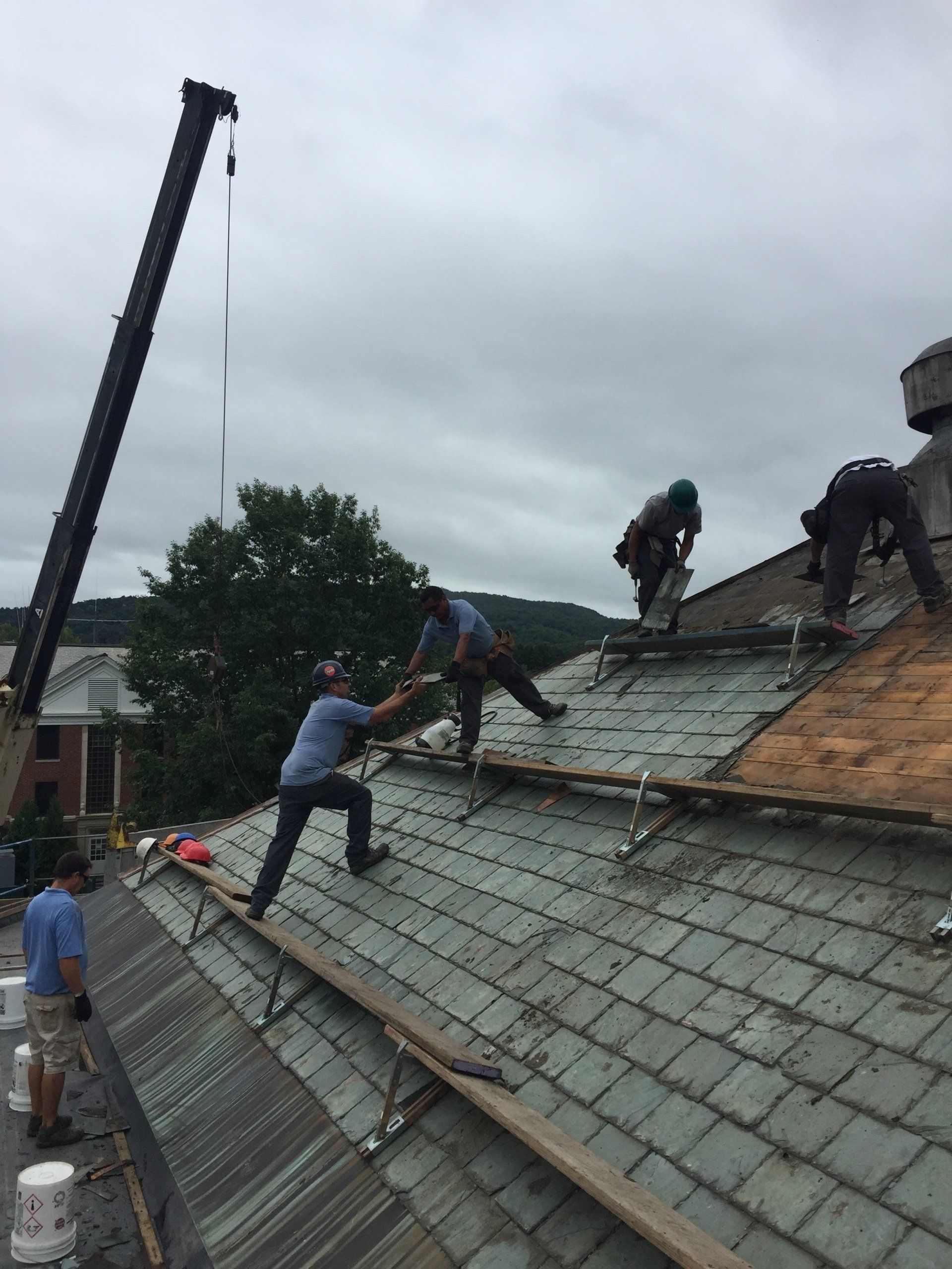 Rodd Roofing employees installing a  slate roof