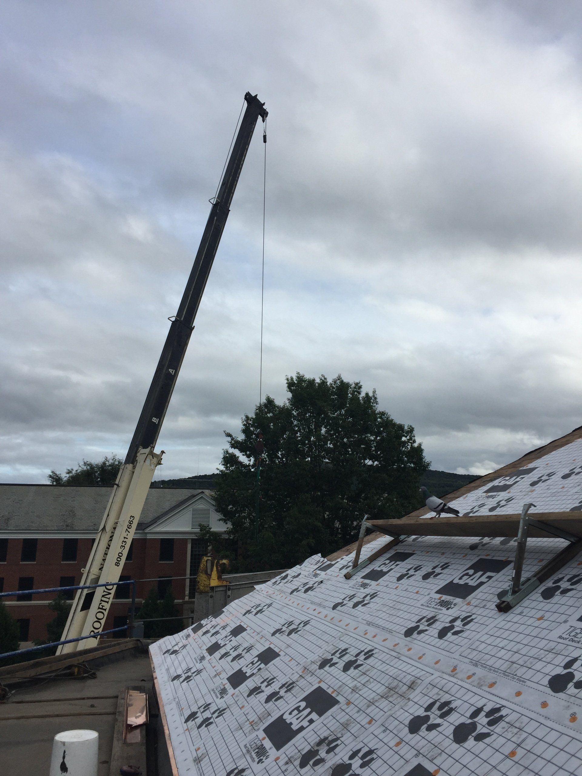 A crane working on the roof