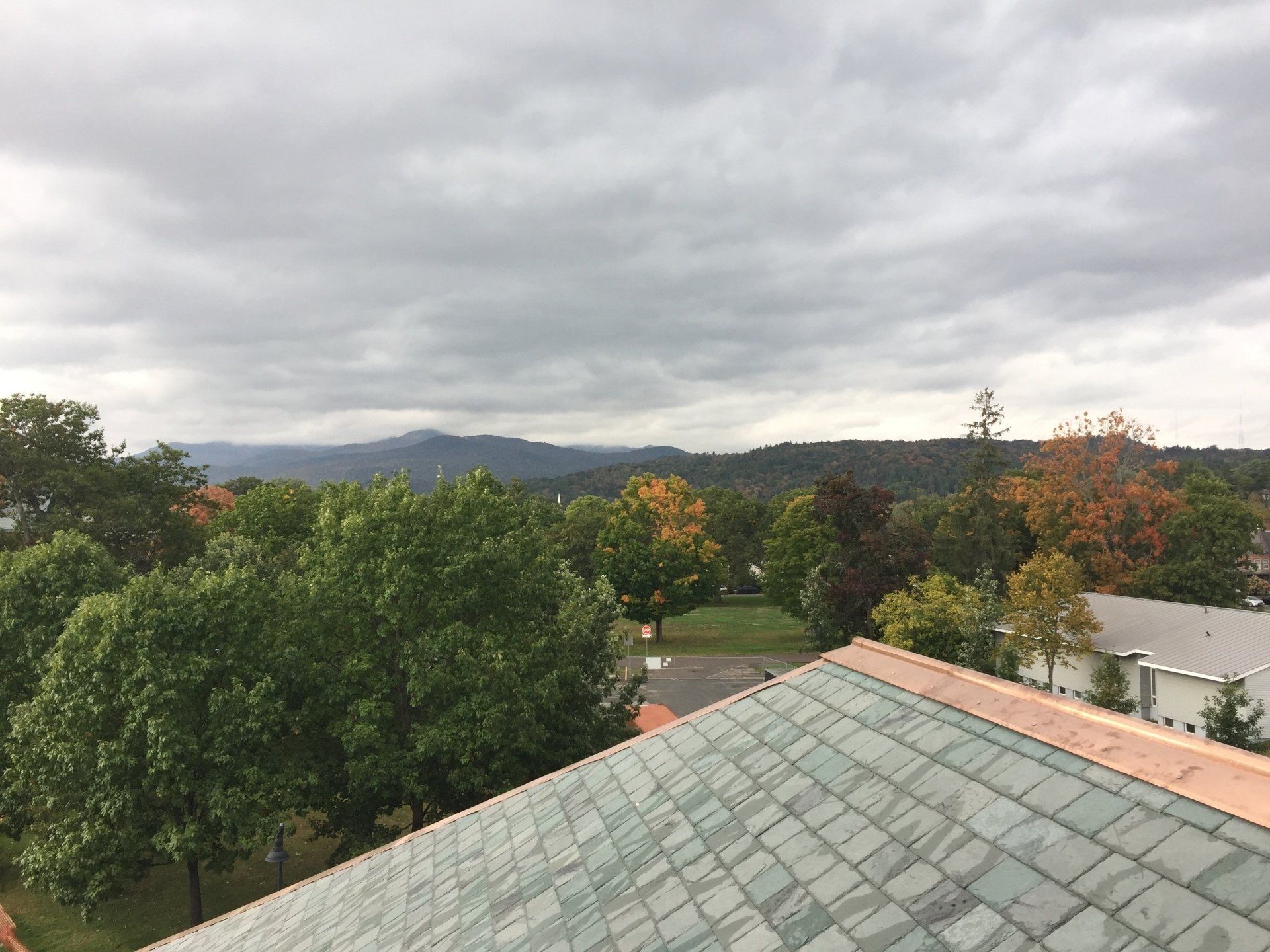 Rodd Roofing installed a commercial building slate roof with copper accents