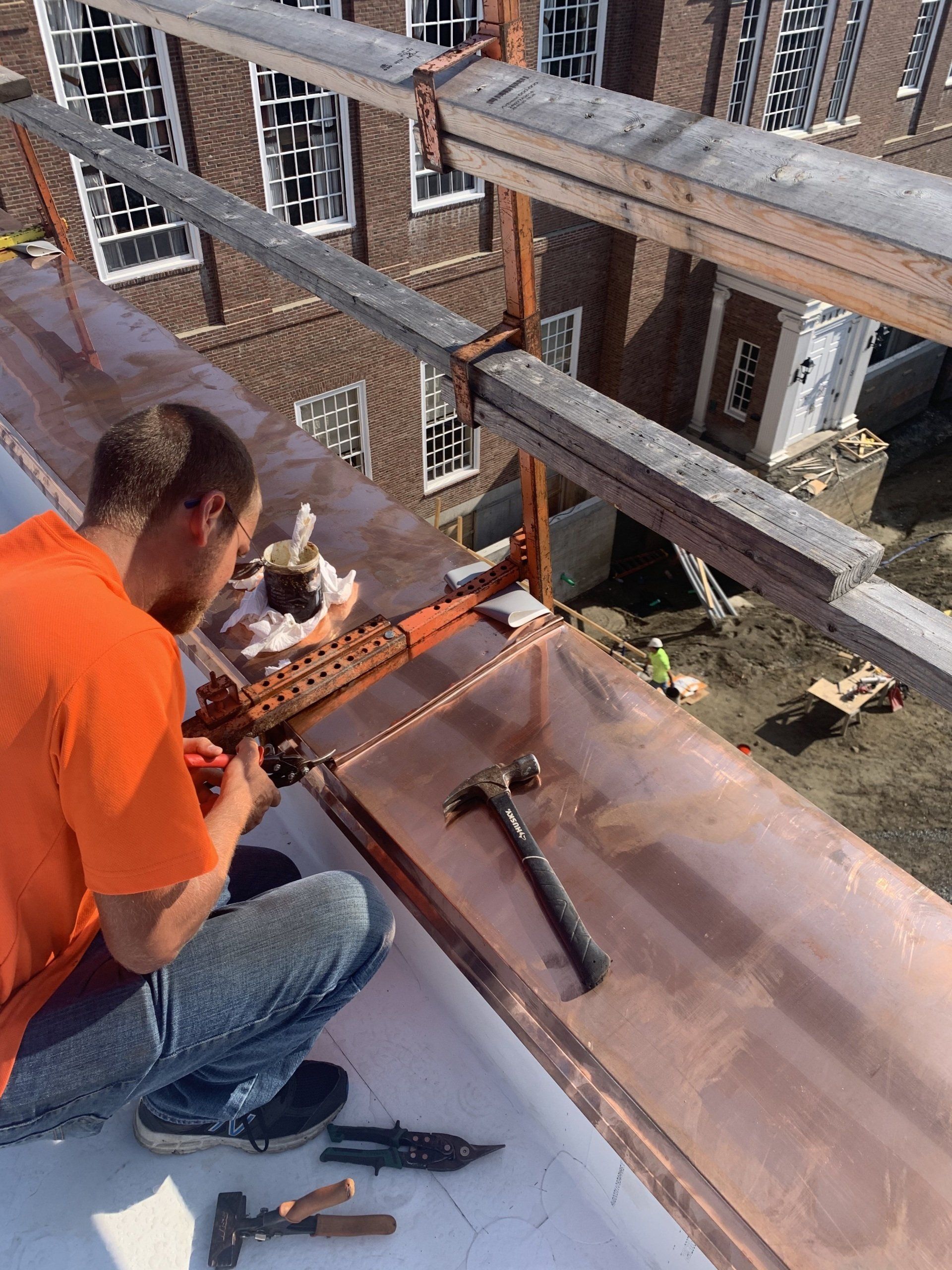 Vermont Roofer working on a copper roofing