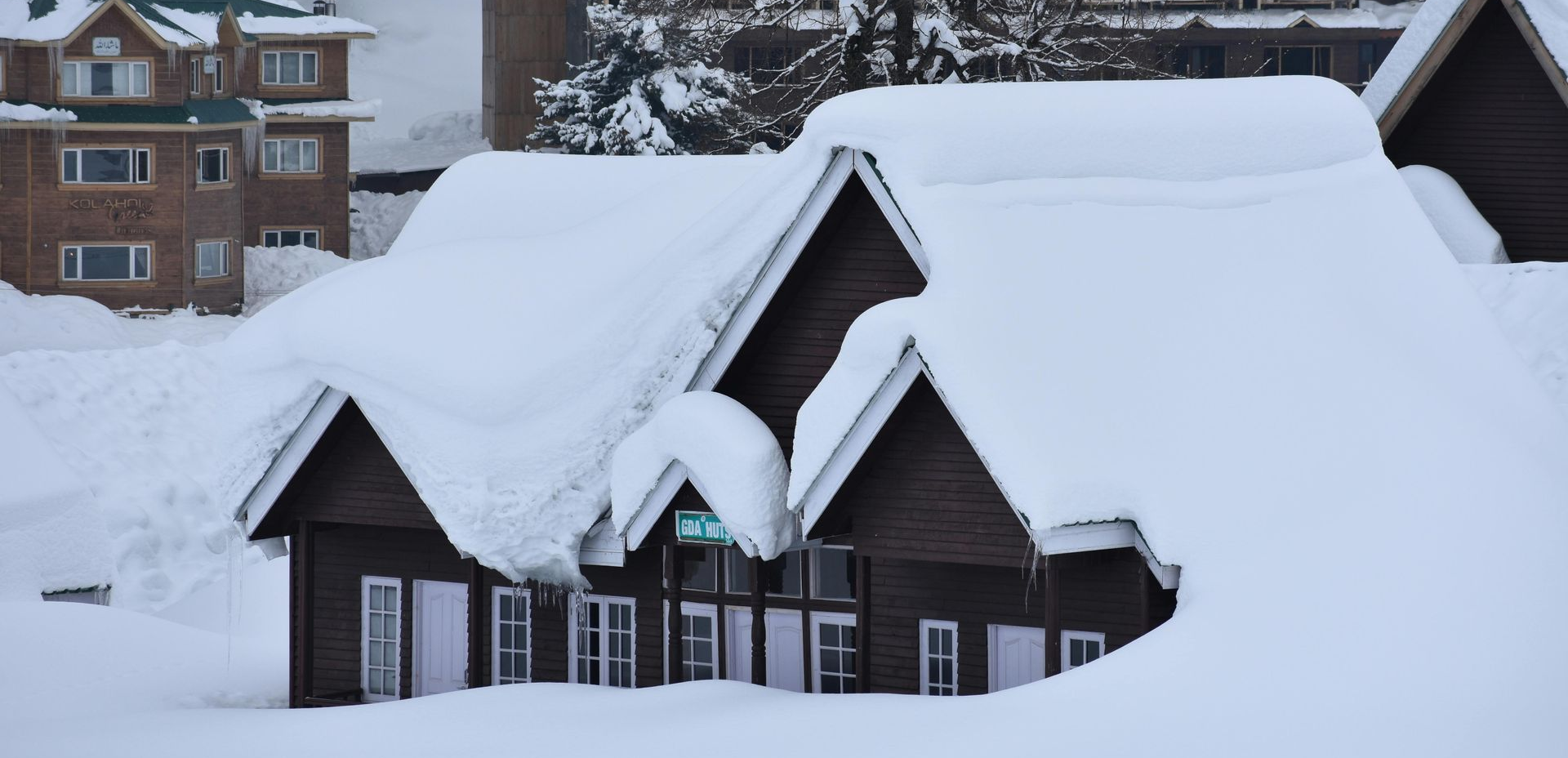 Outside view of a building with extreme snow-load on it.