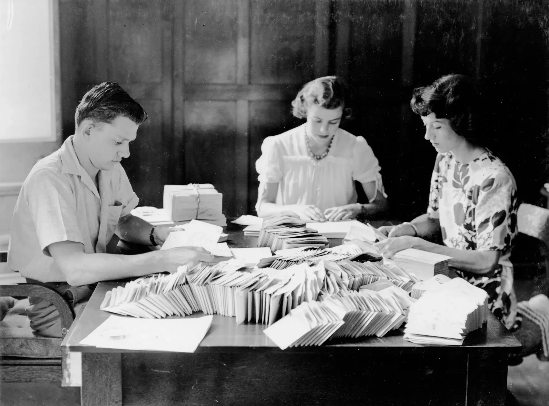 A group of people are having a meeting in an office.