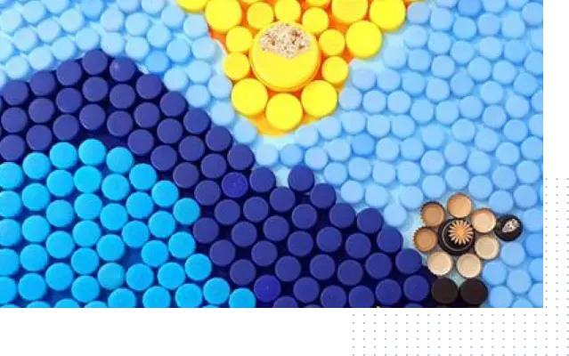 A mosaic of blue and yellow circles with a yellow sun in the middle