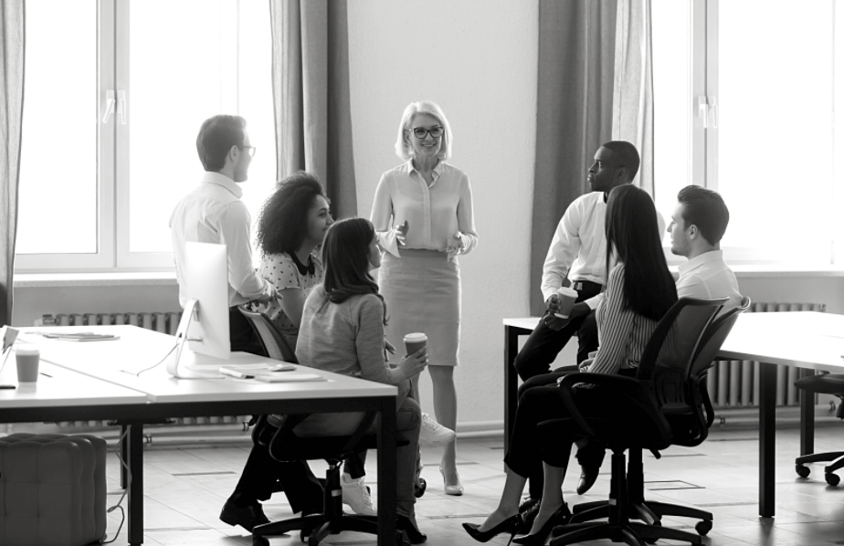A group of people are having a meeting in an office.