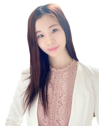 A woman with long hair is wearing a white jacket and a pink top.