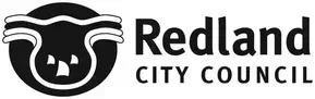 A black and white logo for the redland city council.