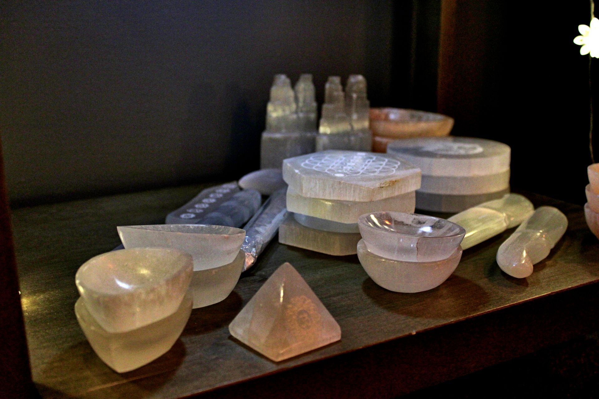 A variety of crystals are sitting on a table