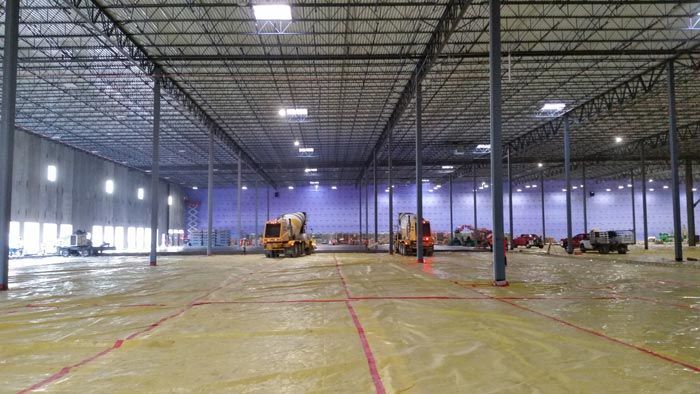 Pouring concrete in the warehouse