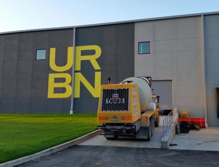 Mixer truck going inside the building